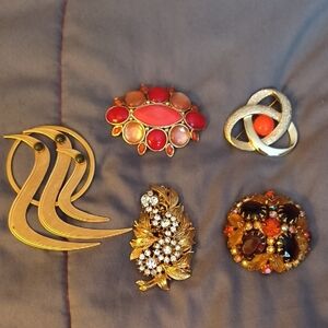 Elegant Gold and Red Brooch Set